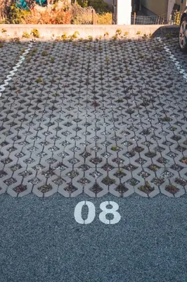 a parking lot with a number on the ground at Maribella Apartment in Maribor