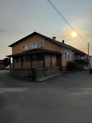 a house sitting on the side of a street at Lipovska Oaza