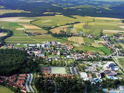 an aerial view of a city with houses and trees at Chonky Cat in Moravske Toplice