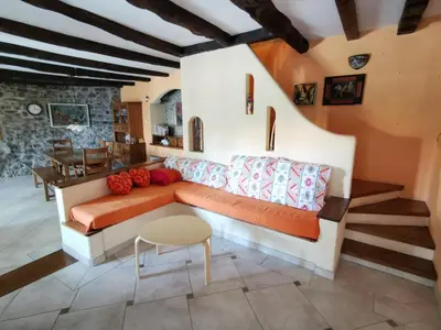 a living room with a couch and a table at Domus Carstica in Sežana