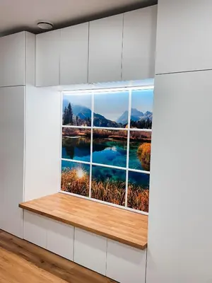 a window in a room with a view of a lake at Central Hostel Lesce-Bled in Lesce