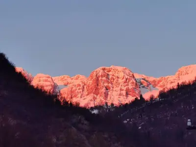 a view of a mountain with red rocks at Hiša Šturm in Tolmin
