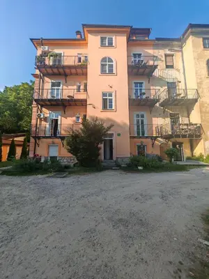 a large building with balconies on the side of it at Mabo apartments - Ljubljana in Ljubljana