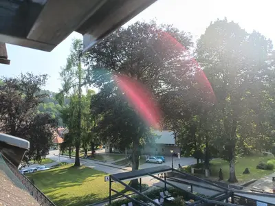a view from a window of a street with trees at Apartment Simon in Škofja Loka