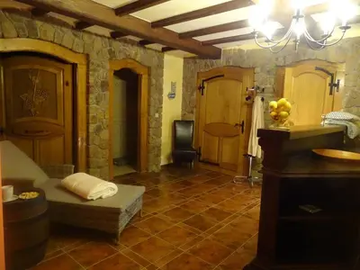 a large room with a bathroom with a sink at Vila Gradisca in Gradišča