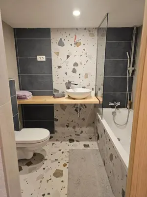 a bathroom with a toilet and a sink and a tub at Studio Masha's fairytale world in Kranjska Gora