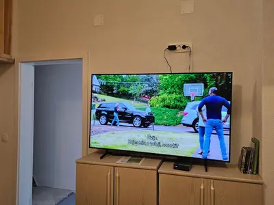 a television screen with a man playing a basketball game at Studio Masha's fairytale world in Kranjska Gora