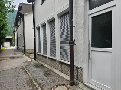 a door of a building next to a street at Studio Masha's fairytale world in Kranjska Gora