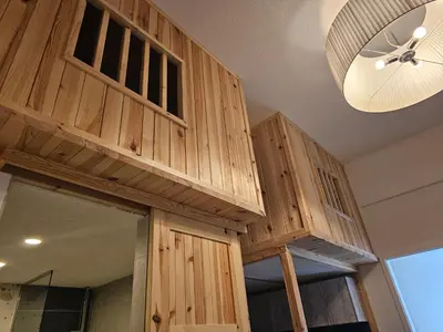a room with wooden cabinets and a ceiling at Studio Masha's fairytale world in Kranjska Gora
