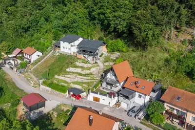 an aerial view of a house with a yard at Apartma Manca in Jesenice na Dolenjskem
