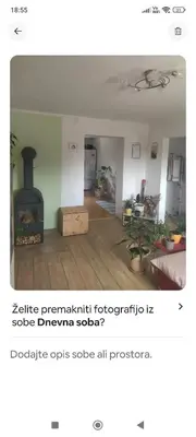 a living room with a wood stove in a room at Lovely 1- bedroom apartment in Skofja Loka in Škofja Loka