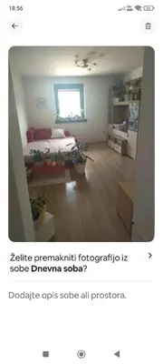 a living room with a bed and a room with at Lovely 1- bedroom apartment in Skofja Loka in Škofja Loka