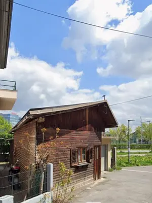 a small brick building with a roof at Studio R in Ljubljana