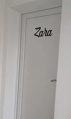 a door with the zoya logo on it at Studio apartma ZARA in Slivnica pri Mariboru
