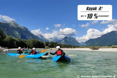 a group of people kayaking down a river at Apartments Bovec House Center in Bovec