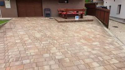 a brick patio with a table in a house at Apartment Tijana in Nomenj