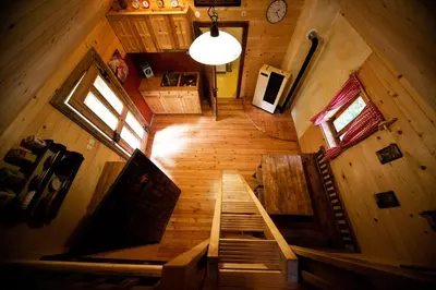 an overhead view of a staircase in a cabin at Domačija Koklej - Apartments Vintage Vacation in Luče