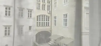 a view from a window of a building at Riva Residence in Old Town Ljubljana by the Cobblers' Bridge in Ljubljana