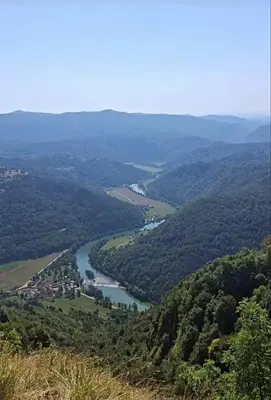 a view of a river from the top of a mountain at Družinski apartmaji Judnič in Adlešiči