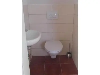 a bathroom with a toilet and a sink at Holiday home with 2 bedrooms in Zgornja Kungota