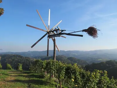 a wind turbine on top of a vineyard at Holiday home with 2 bedrooms in Zgornja Kungota