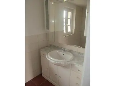 a bathroom with a sink and a mirror at Holiday home with 2 bedrooms in Zgornja Kungota