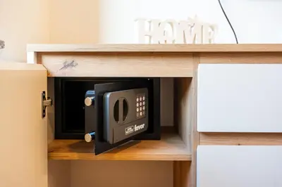 a microwave oven in a shelf in a room at Vila Hrastnica in Škofja Loka