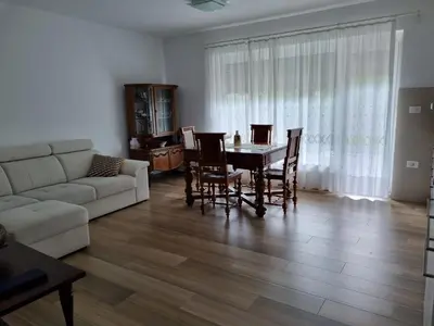 a living room with a table and chairs and a couch at Vipava Valley Stay - Apartment Miki - With Patio, Parking & Pets OK in Ajdovščina