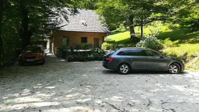 a car parked in front of a house at Chalet Iskaretreat in Ig