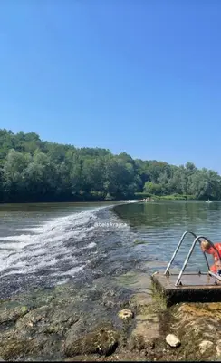 a raft in the middle of a river at Družinski apartmaji Judnič in Adlešiči
