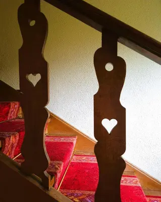 a mirror with a reflection of a bed in a room at Vila Moka near Bled-Entire place with Garden Retreat in Lesce
