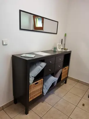 a desk in a room with a mirror at Pr DOLENC in Petrovče