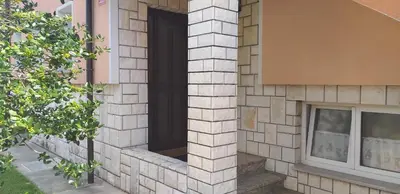 a window on the side of a building at Love 2 Solkan in Nova Gorica