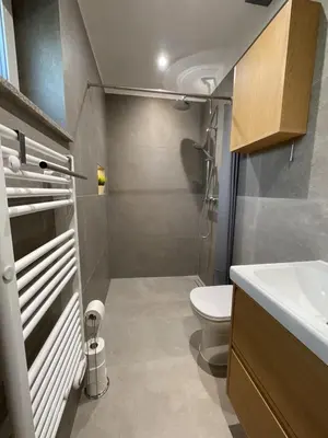 a small bathroom with a toilet and a sink at Apartma Tomy in Domžale