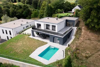 an aerial view of a house with a swimming pool at Vila Altura- Luxury Hiltop Retreat with Panoramic View & Teracce in Rogaška Slatina