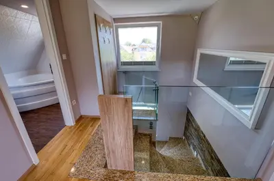 a room with glass shelves and a window at Apartma Mars in Brest