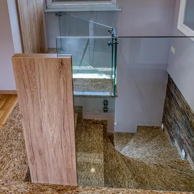 a shower with a glass door in a room at Apartma Mars in Brest