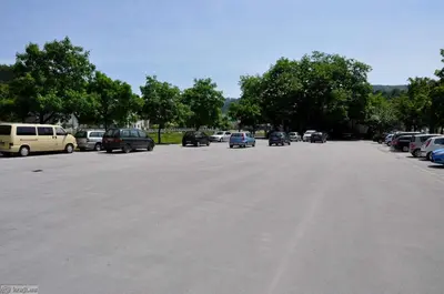 a large parking lot with cars parked in it at Hiša Elsbacher Laško in Laško