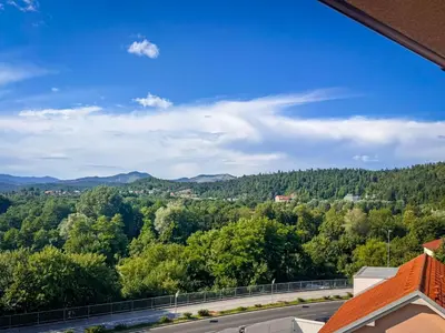 a view of the mountains from the balcony of a house at Apartment Adelsberg Inn-1 by Interhome in Postojna