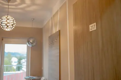 a room with a door with the number on it at Garni Hotel Krško in Leskovec pri Krškem
