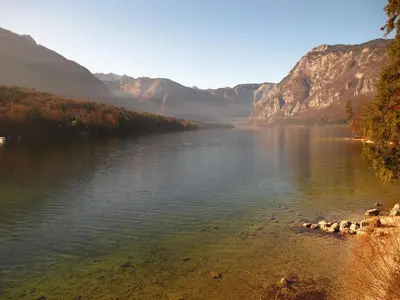 a view of a lake with mountains in the background at Apartment Zalokar in Bohinj