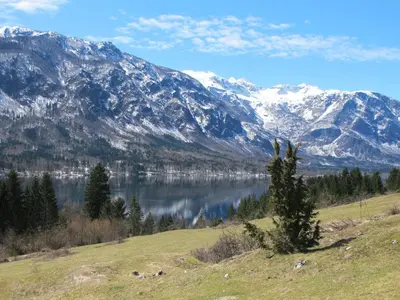 a view of a mountain range with a lake at Apartment Zalokar in Bohinj