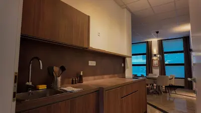 a kitchen with a sink and a counter top at Luxury Apartment Simba C in Smarjeske Toplice