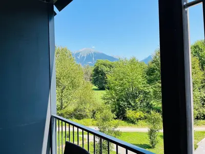 a balcony with a view of a mountain at Vitan Apartment in Bled