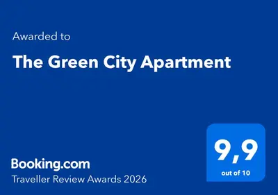 a blue sign that reads the green city apartment at The Green City Apartment in Ljubljana