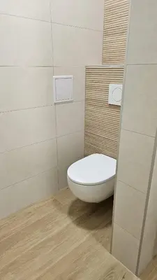 a bathroom with a white toilet in a room at Memento Ljubljana Apartments with Private Bathrooms & Shared Kitchen in Ljubljana