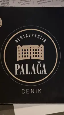 a sign for a palaia center on a table at Funky Stylish Penthouse in Ljubljana