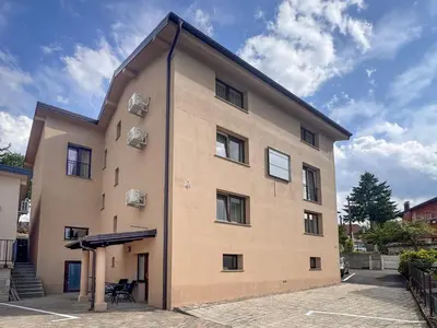 a large brick building with aventh floor at Apartment Adelsberg Inn-2 by Interhome in Postojna