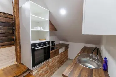 a small kitchen with a sink and a stove at APARTMA Viktor in Ormoz