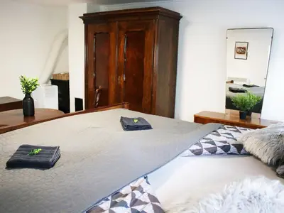 a bedroom with a bed with two towels on it at Vineyard cottage Ranč pri Hanzeku in Zgornji Leskovec